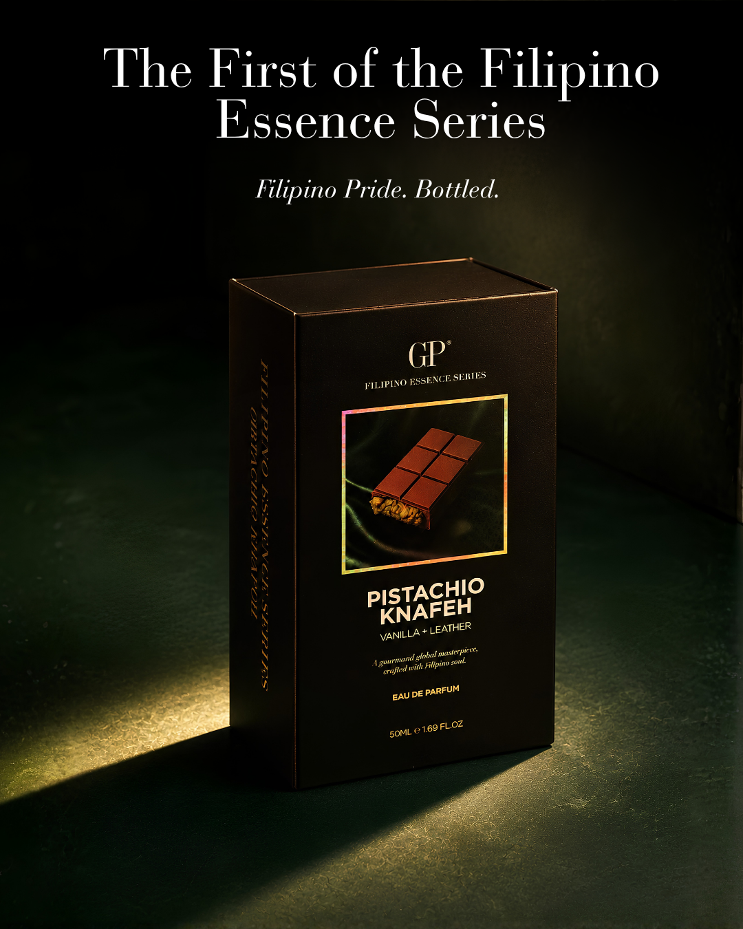 A dark brown rectangular box for GP Pistachio Knafeh Vanilla Flavour Eau de Parfum stands on a black surface with dramatic spotlighting. White text at the top reads 'The First of the Filipino Essence Series' and 'Filipino Pride.